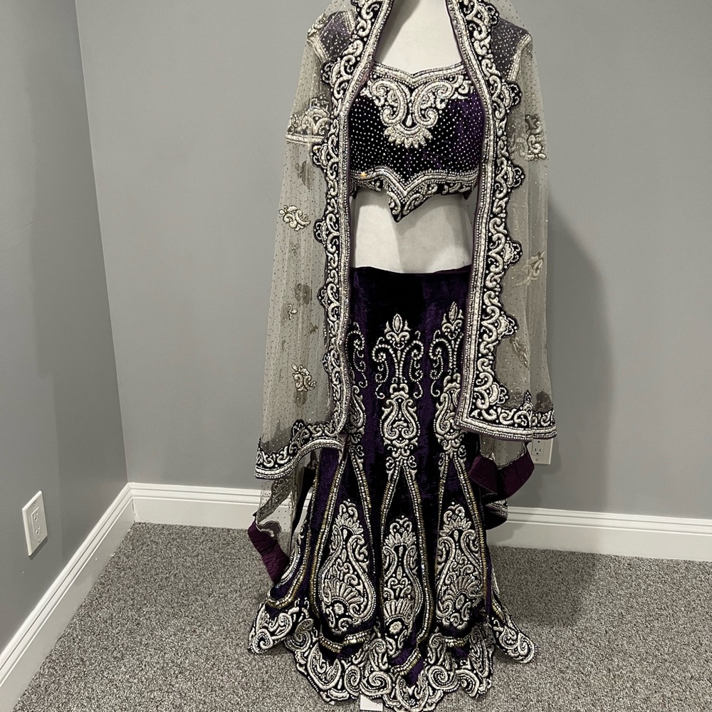 Purple heavy stonework lehenga